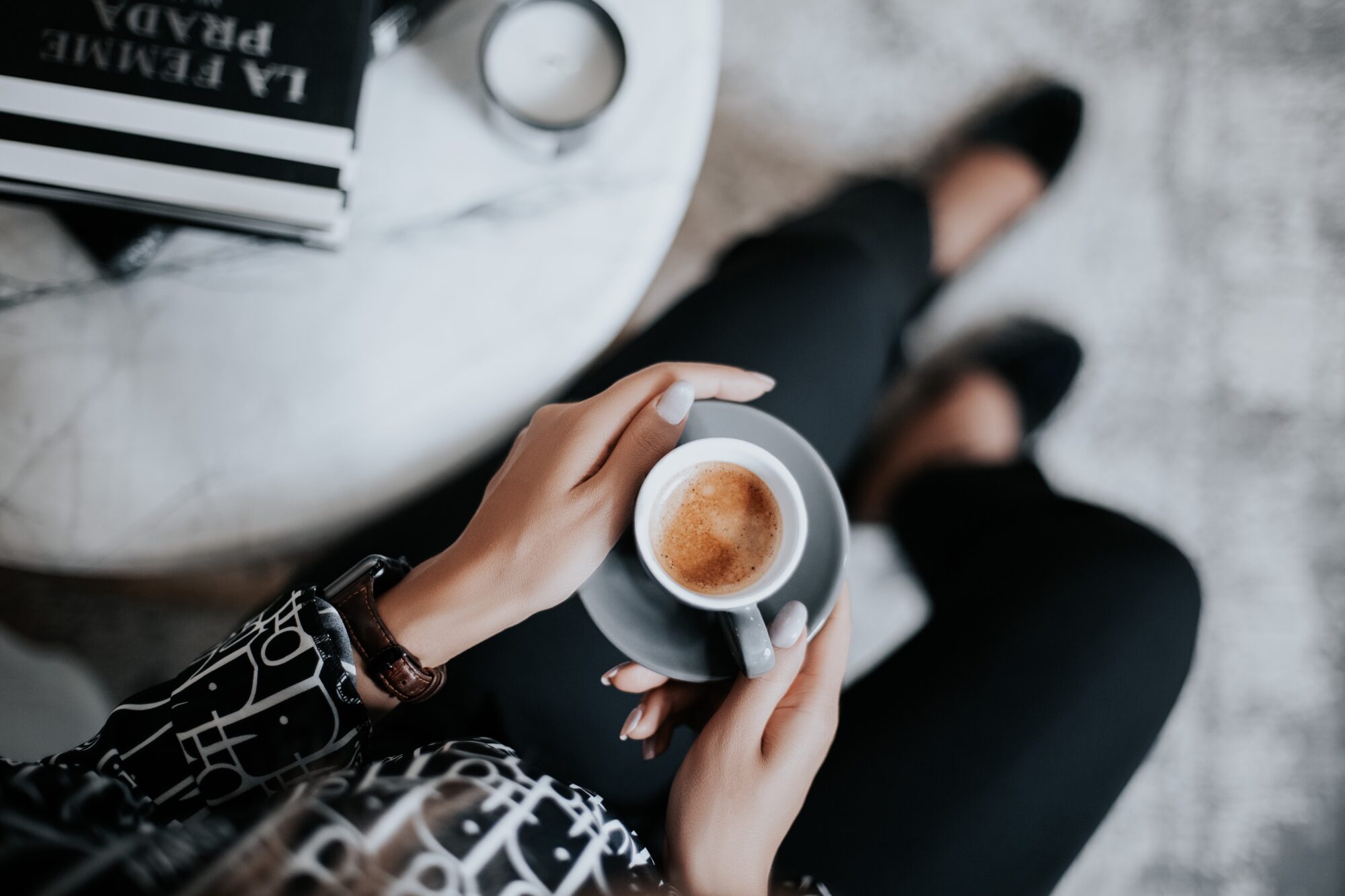 Woman holding coffee mug